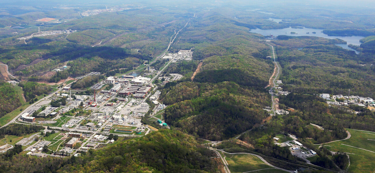 Aerial photo shows many buildings among hills