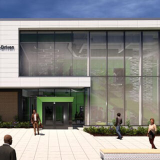 Exterior of building with a mostly glass facade.